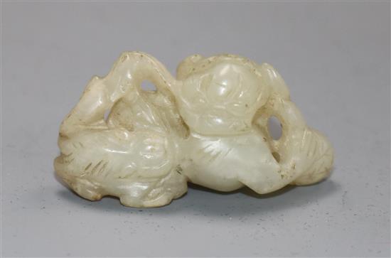 A 19th century Chinese pale celadon jade lion-dog cub carving, (604)